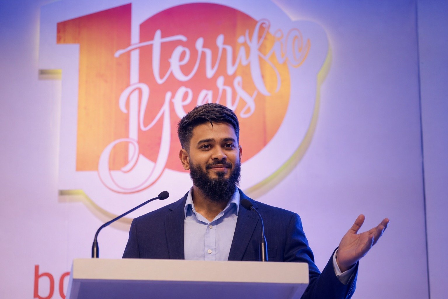 Rakibul Hasan Razu speaking from a lectern